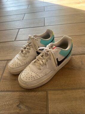 Nike Kids White Sneakers with Teal and Black Accents